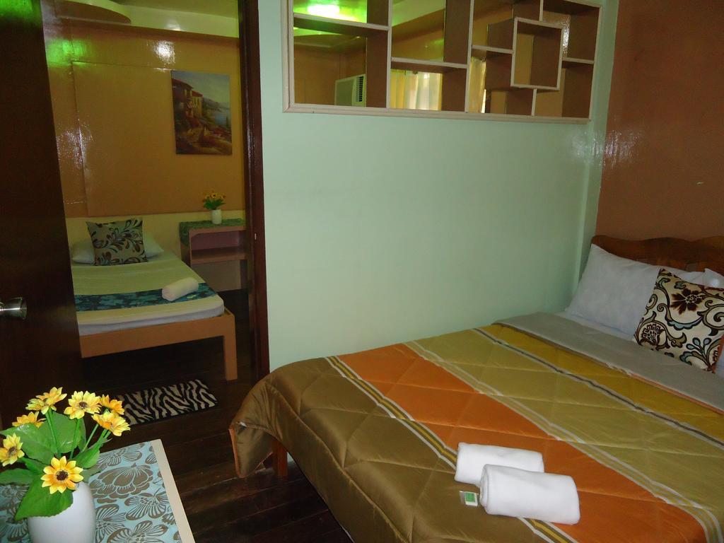 Villa Travelista Travel Lodge Puerto Princesa Chambre photo